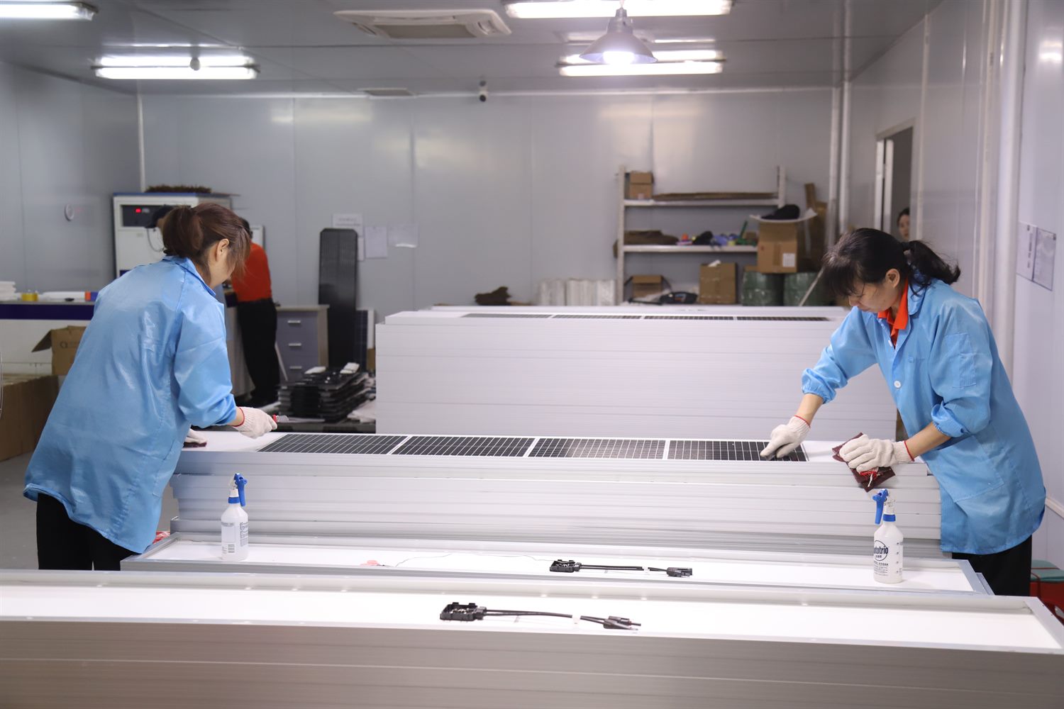Packed flexible solar panels and cartons in warehouse